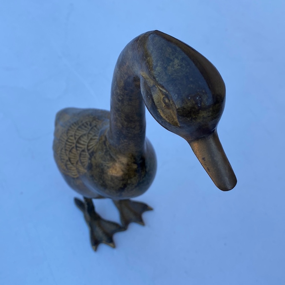 Brass colored duck heavy no markings